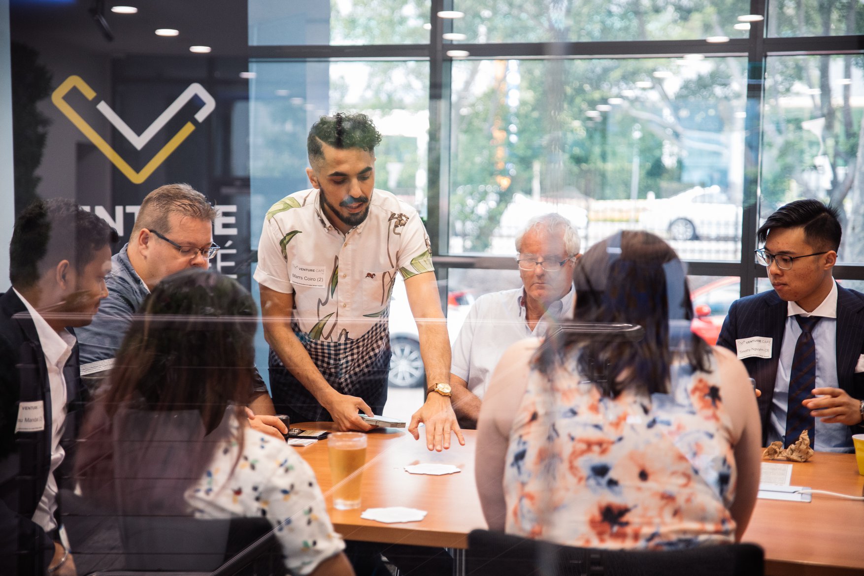 Person presenting to an engaged group of people